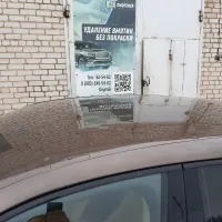Porsche Panamera на осмотре после града