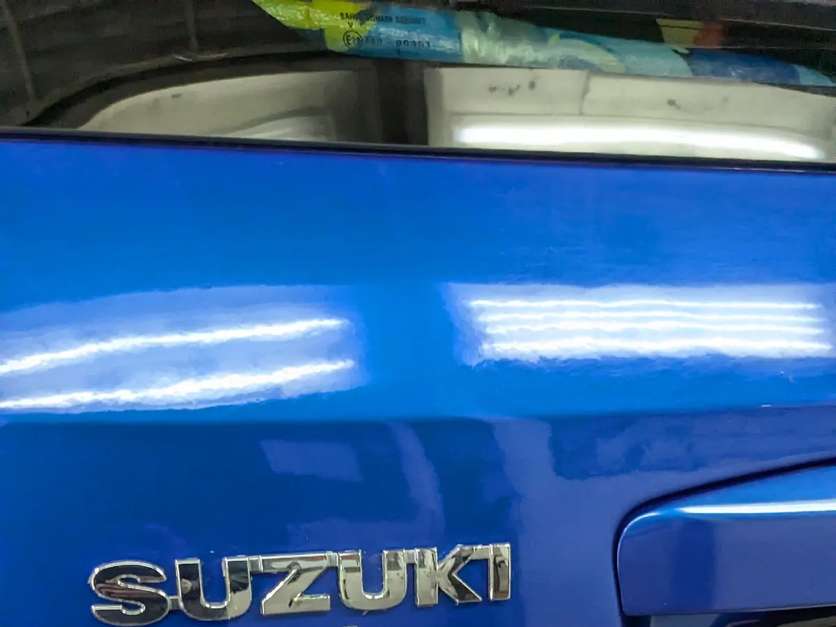 Крышка багажника Suzuki SX4 после ремонта без покраски